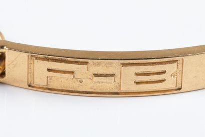 Identity bracelet in yellow gold centered...