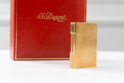 ST DUPONT
A set of three lighters, one in...