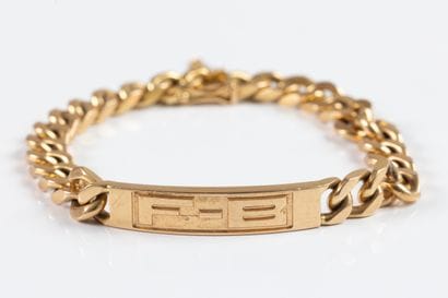 Identity bracelet in yellow gold centered...