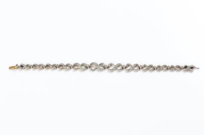 Drop bracelet in yellow gold and platinum...