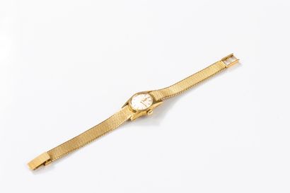 OMEGA circa 1960
Yellow gold wristwatch,...