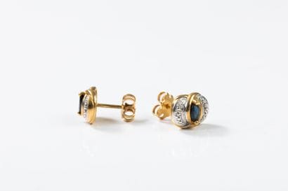 Pair of gold earrings with interlaced design,...