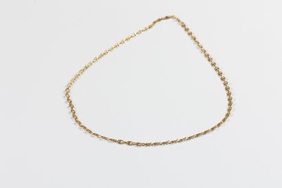Stylized coffee bean necklace in yellow gold....