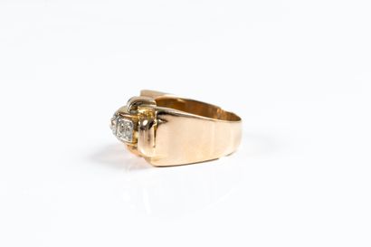 Gold tank ring centered with a line of old-cut...