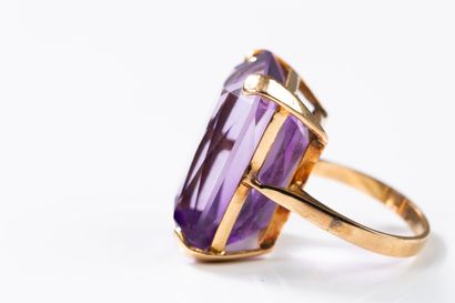 Yellow gold ring set with a large rectangular...