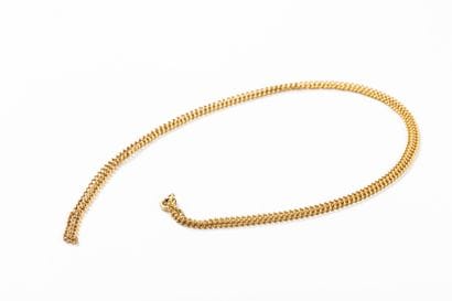 Yellow gold curb chain. Spring-ring clasp....