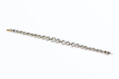 Drop bracelet in yellow gold and platinum...