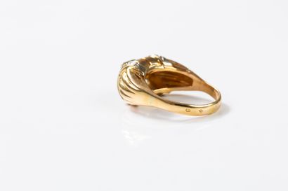 Yellow gold band ring with gadroons set with...