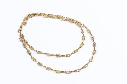 Solid yellow gold long necklace with openwork...