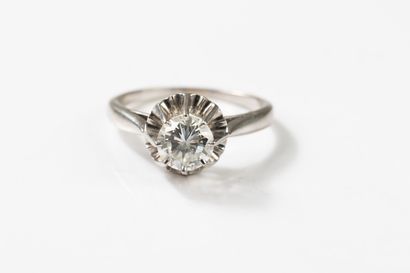 White gold and platinum solitaire ring centered...