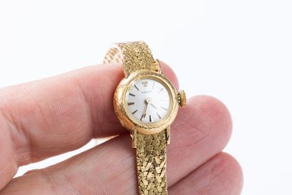TISSOT circa 1960
Yellow gold wristwatch,...