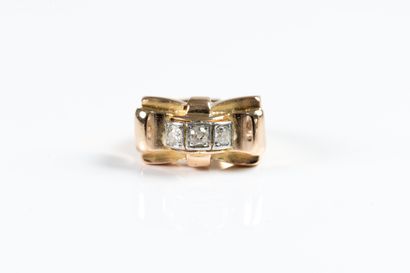 Gold tank ring centered with a line of old-cut...