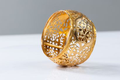 Yellow gold cuff bracelet with floral and...