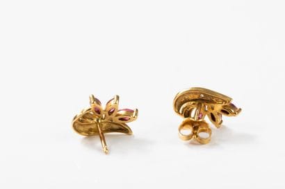 Pair of gold earrings each set with three...