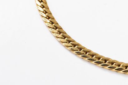 Yellow gold English-link necklace with a...