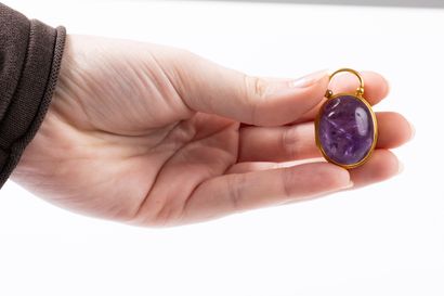Opening pendant in yellow gold set with two...