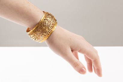 Yellow gold cuff bracelet with floral and...