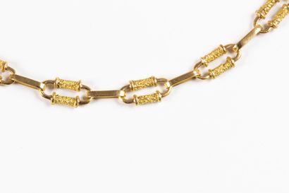 Solid yellow gold long necklace with openwork...