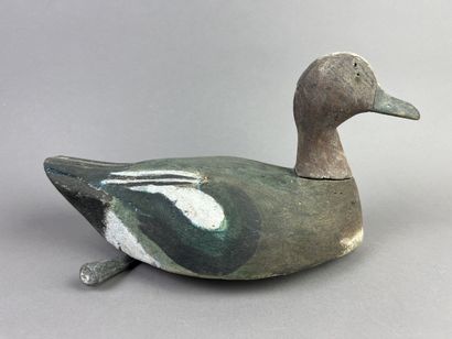 Antique wooden duck caller. Presence of its...