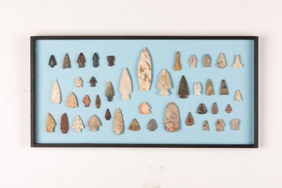Set of 42 carved stone arrowheads and spearheads,...