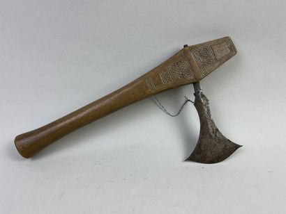Axe with iron blade set in a wooden handle...