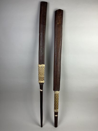 Two heavy wooden war clubs (armas borduna)...