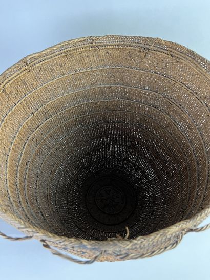 A large, ancient woven basket worn by shamans...