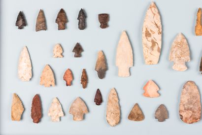 Set of 42 carved stone arrowheads and spearheads,...