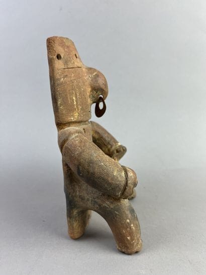 Cacique. Representation of a seated dignitary,...