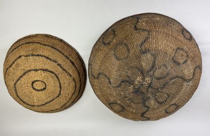 Two very old baskets for transporting and...
