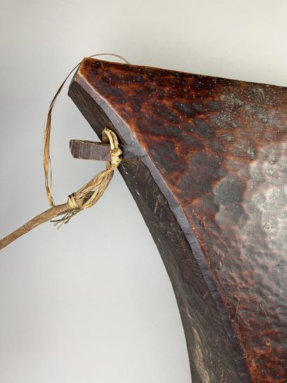 Slot drum. Idiophone. Recessed wood with...