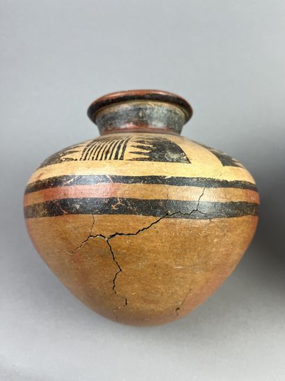 Two bowls, one with geometric decoration,...