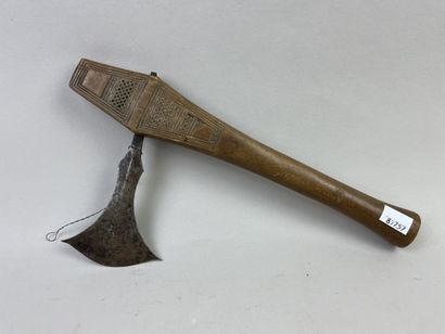 Axe with iron blade set in a wooden handle...