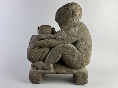 Sculpture depicting a simian figure holding...