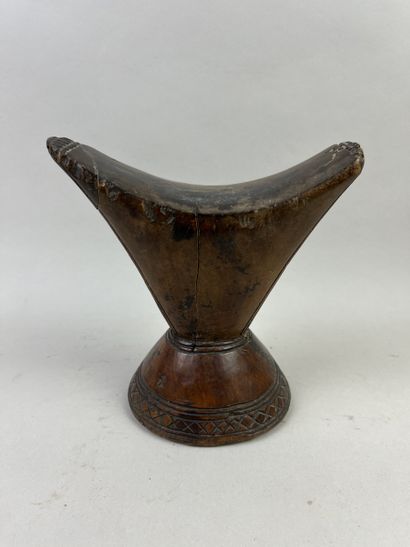 Neck rest. Wood with a beautiful brown patina...