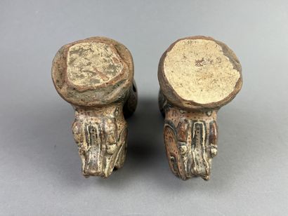 Two superb feet from a tripod bowl depicting...