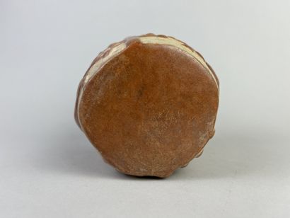 Spherical vase with a flat haystack topped...