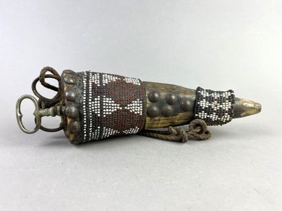 Mohara talisman horn, partially covered with...