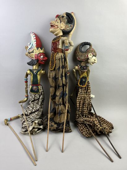 Three Wayang Golek rod puppets. The carved...