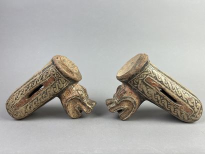 Two superb feet from a tripod bowl depicting...