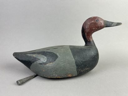 Antique wooden duck caller. Presence of its...