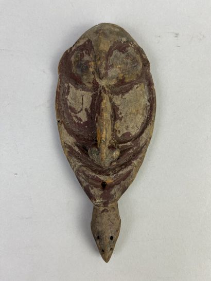 Small amulet head representing an ancestor's...