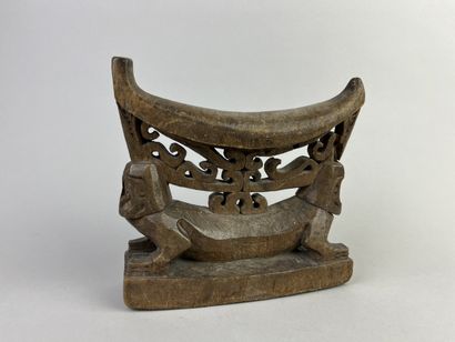 Beautiful old neck-rest featuring two figures...