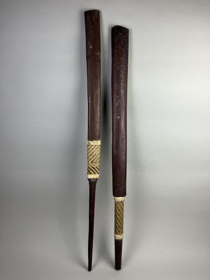 Two heavy wooden war clubs (armas borduna)...