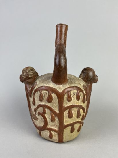 Spherical vase with a flat haystack topped...