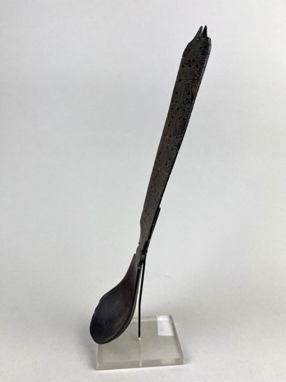 Large spoon decorated with geometric motifs....