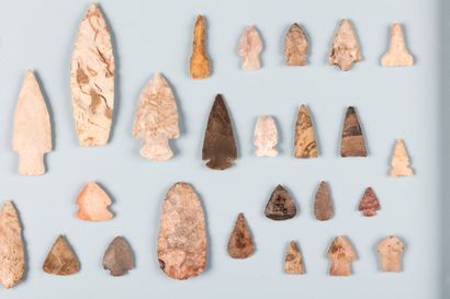 Set of 42 carved stone arrowheads and spearheads,...