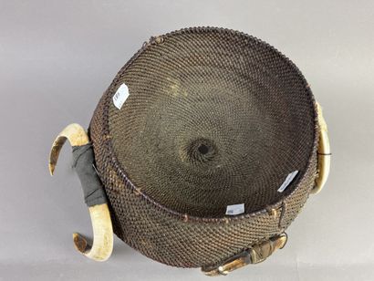 Round warrior's headdress, surrounded by...