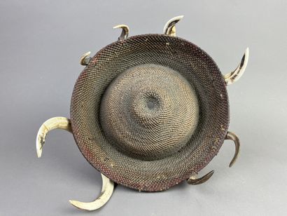 Round warrior's headdress, surrounded by...