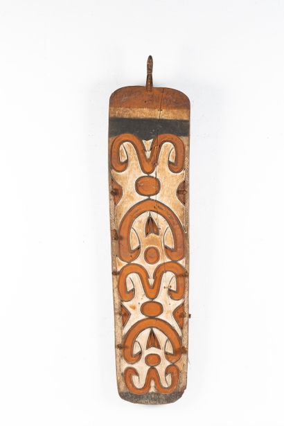 Large war shield surmounted by a representation...